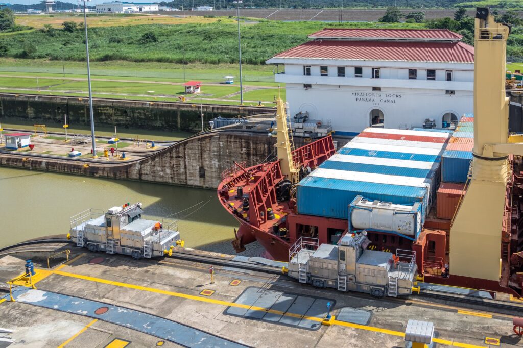 Cargo Ship crossing Panama Canal at Miraflores Locks - Panama City, Panama